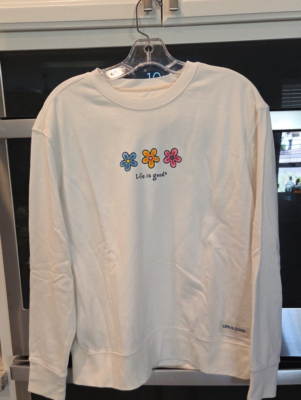 Life is Good Womens Cream Sweatshirt with Flower Graphic